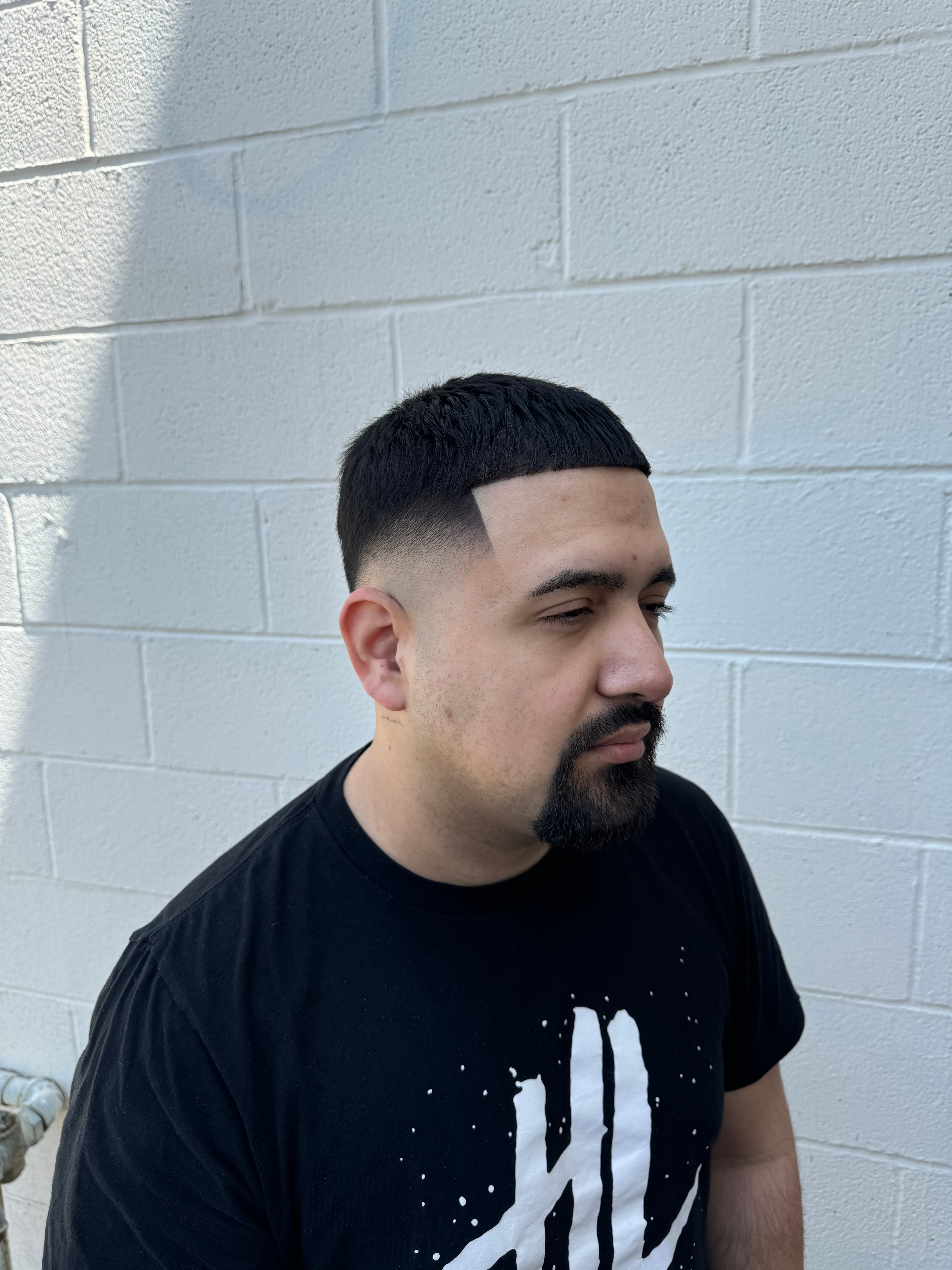 Outdoor haircut with goatee